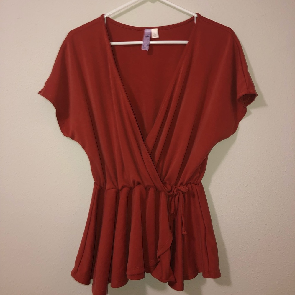 Francesca’s Orange peplum blouse